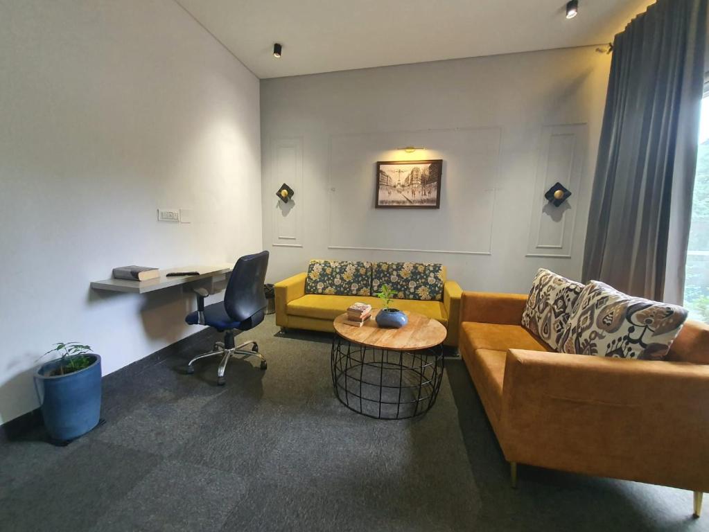 Posezení v ubytování Mallenzo Suites Dlf Phase 1