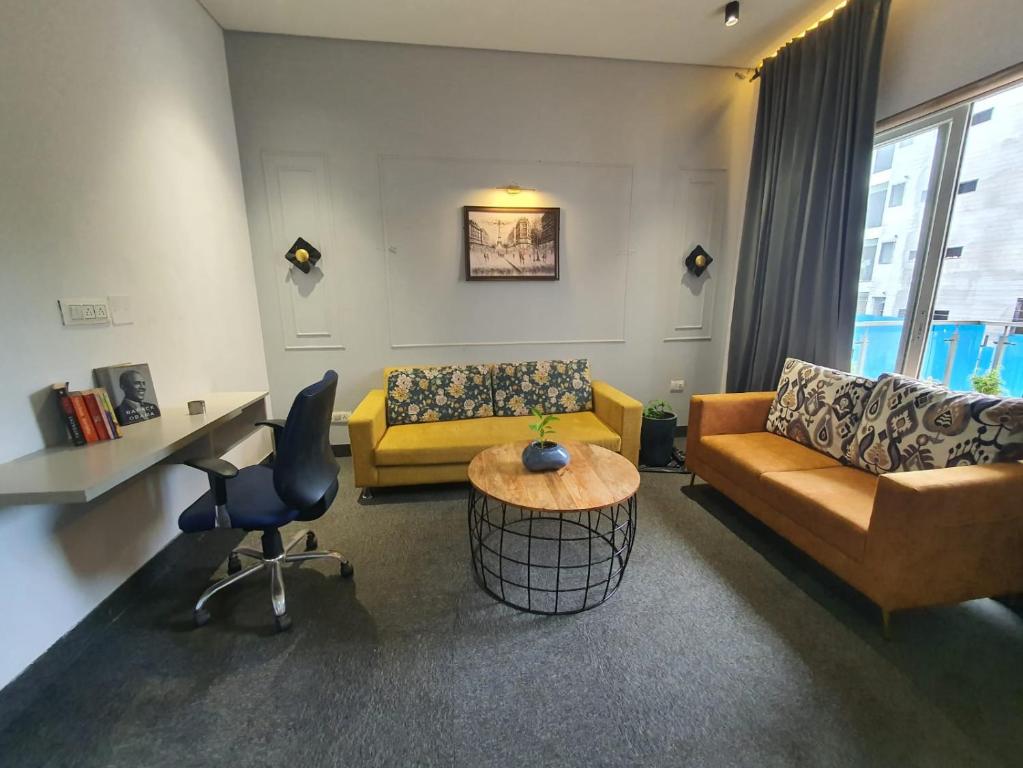 Posezení v ubytování Mallenzo Suites Dlf Phase 1
