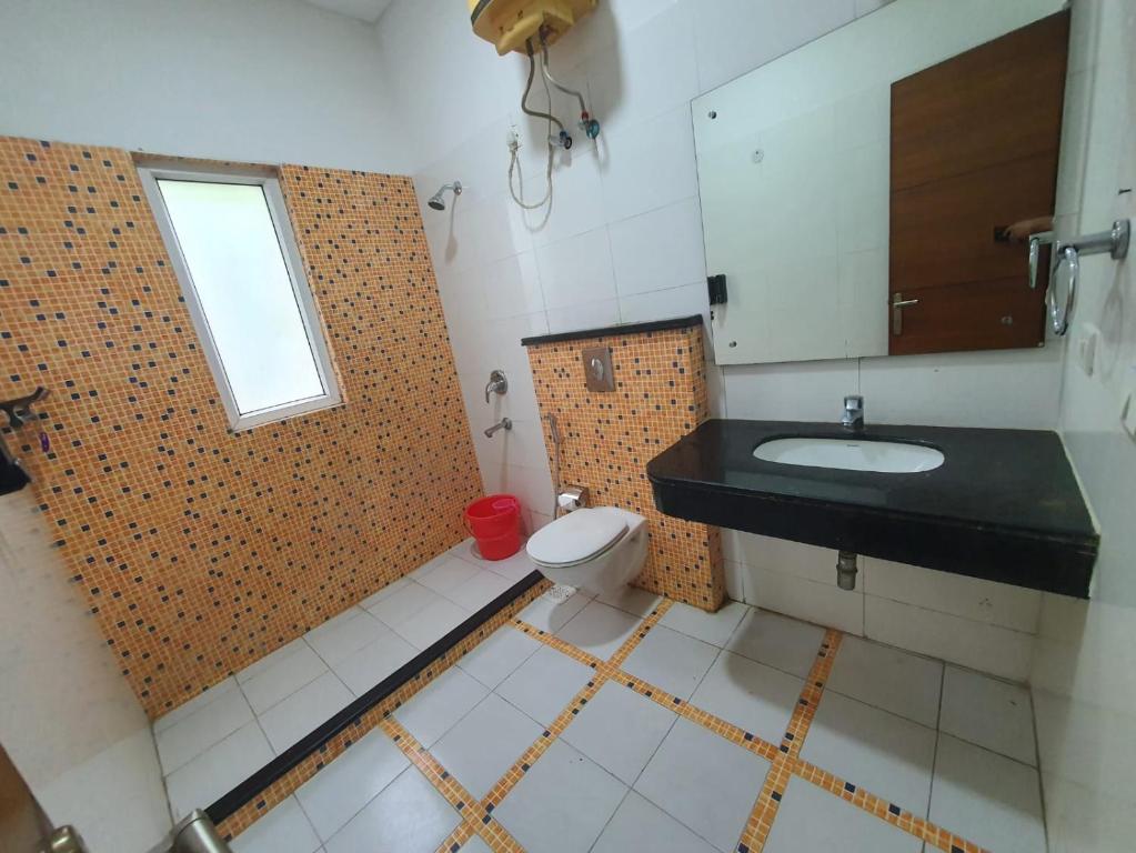 Koupelna v ubytování Mallenzo Suites Dlf Phase 1