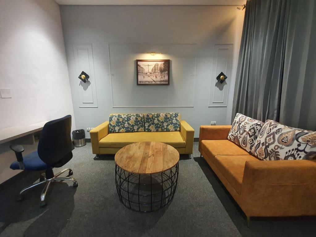 Posezení v ubytování Mallenzo Suites Dlf Phase 1