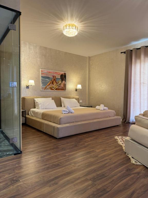 Postel nebo postele na pokoji v ubytování Festim Villa Hotel