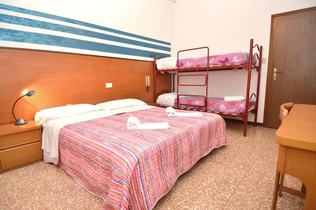 Postel nebo postele na pokoji v ubytování Hotel Edera