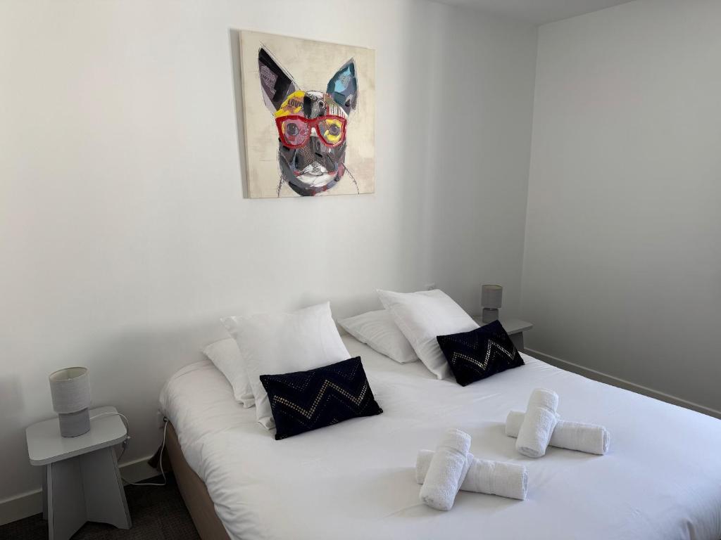 Postel nebo postele na pokoji v ubytování HOTEL DU MOULIN