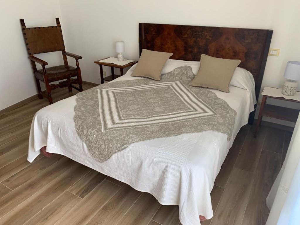 Postel nebo postele na pokoji v ubytování Le Scalette