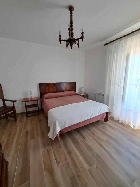 Postel nebo postele na pokoji v ubytování Le Scalette