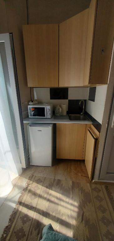 Kuchyň nebo kuchyňský kout v ubytování room