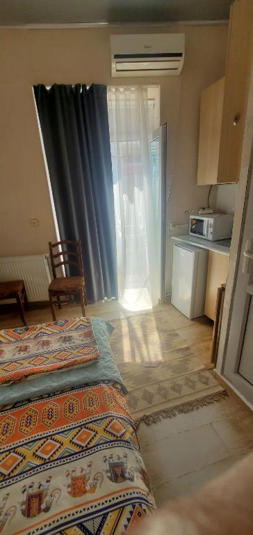 Kuchyň nebo kuchyňský kout v ubytování room