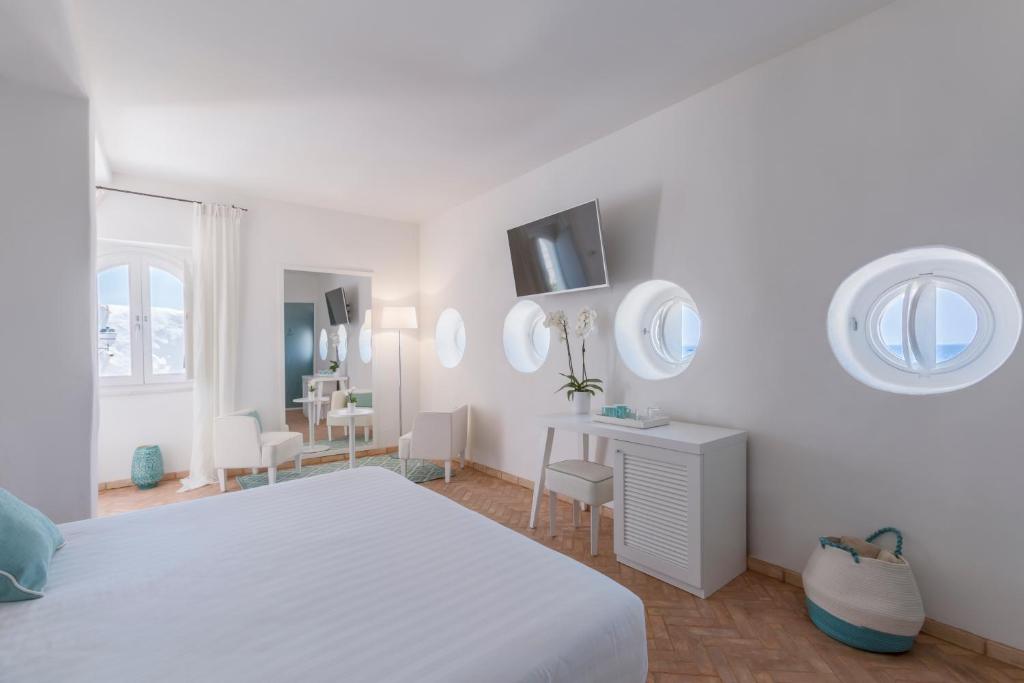Posteľ alebo postele v izbe v ubytovaní Relais La Ghinghetta