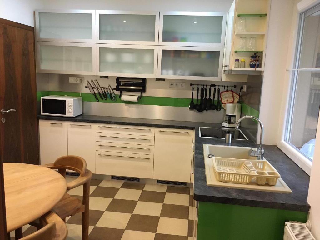 Kuchyňa alebo kuchynka v ubytovaní Rabbit apartman