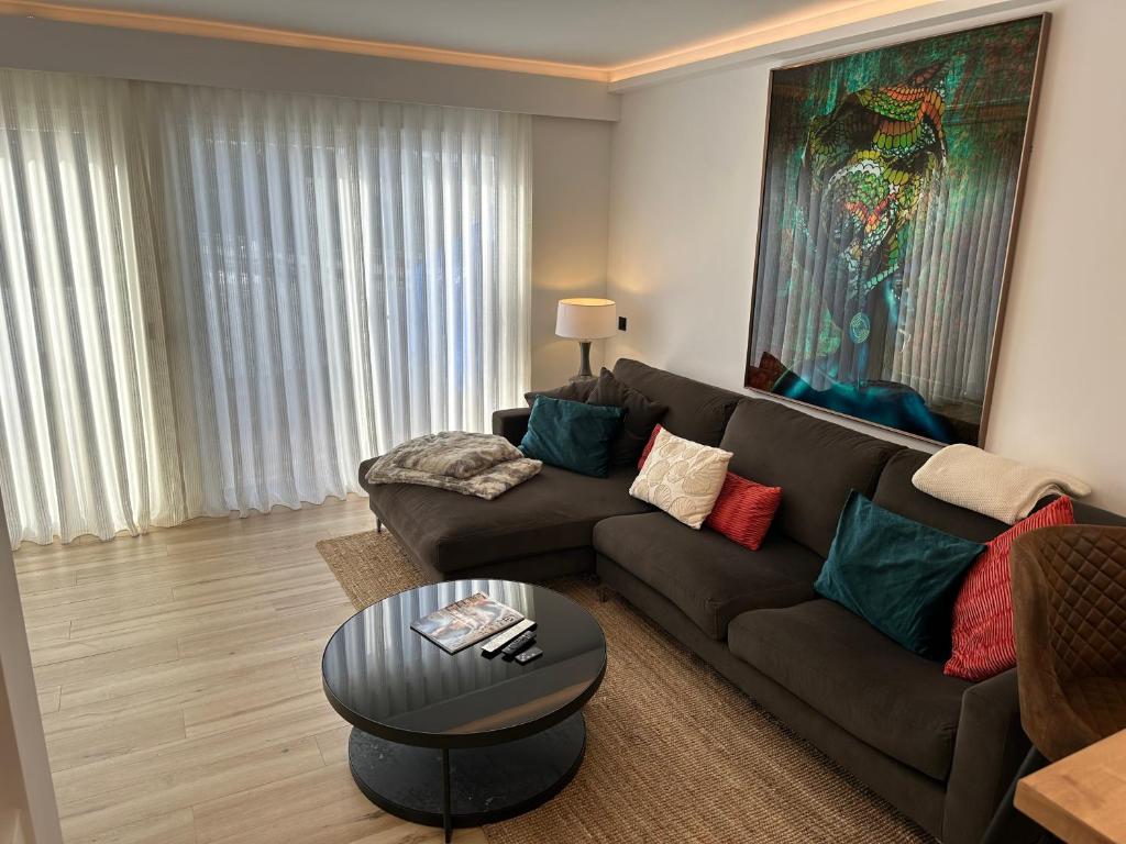 Et opholdsområde på La Cala Penthouse Retreat