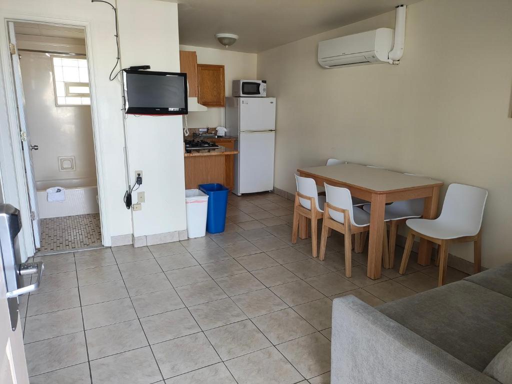 Kuchyň nebo kuchyňský kout v ubytování Condor Motel - Beach Block