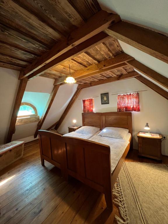 Postel nebo postele na pokoji v ubytování Erdőszéli Parasztház Kékkút