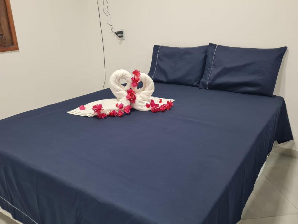 Postel nebo postele na pokoji v ubytování Chalé dos Anjos