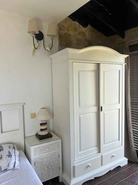 Postel nebo postele na pokoji v ubytování STONE Villa