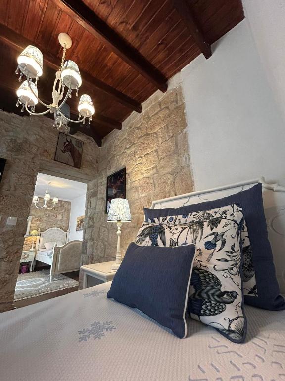 Postel nebo postele na pokoji v ubytování STONE Villa
