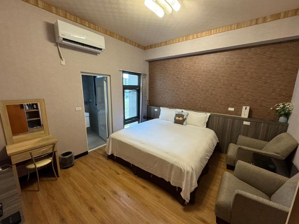Postel nebo postele na pokoji v ubytování Otter Hotel