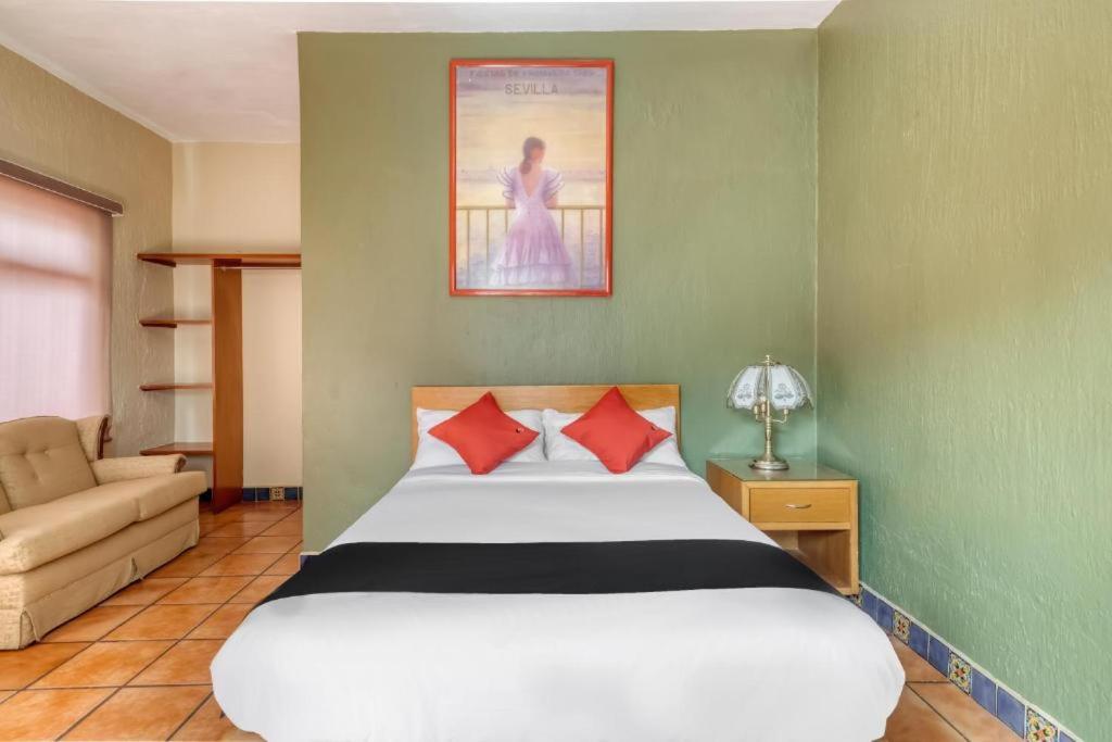Postel nebo postele na pokoji v ubytování Hotel Arana Tonalá
