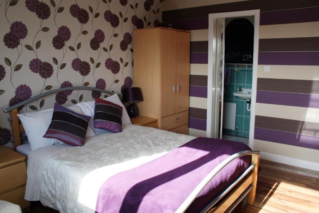 Postel nebo postele na pokoji v ubytování Ceecliff House