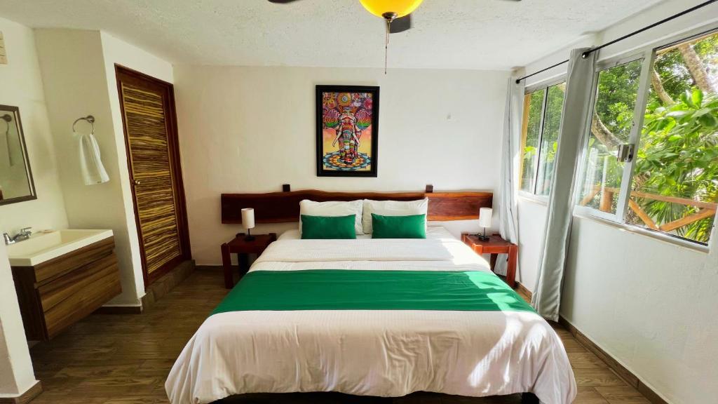 Postel nebo postele na pokoji v ubytování Hotel Tequila Cancun