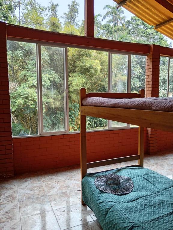 En eller flere senge i et værelse på SOL & SELVA Hostal Mocoa Putumayo