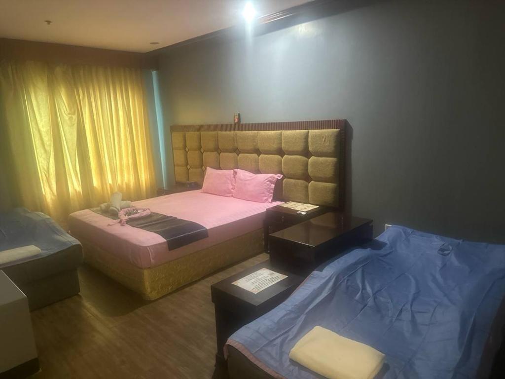 Postel nebo postele na pokoji v ubytování Jjimjbang hotel spa