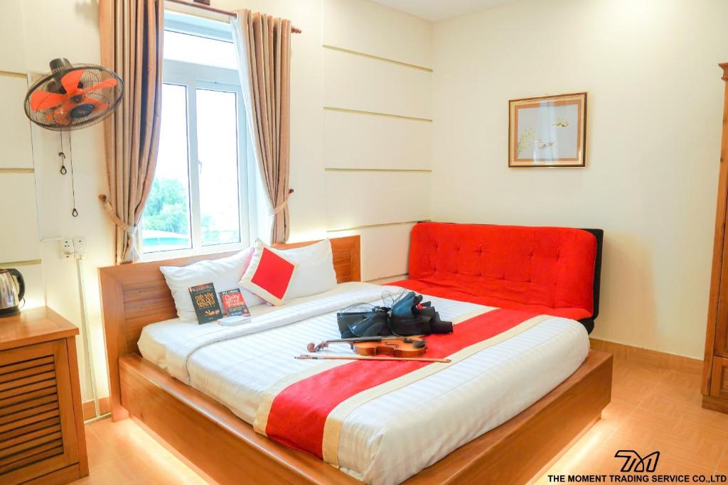 Postel nebo postele na pokoji v ubytování Seika Hotel by The Moment