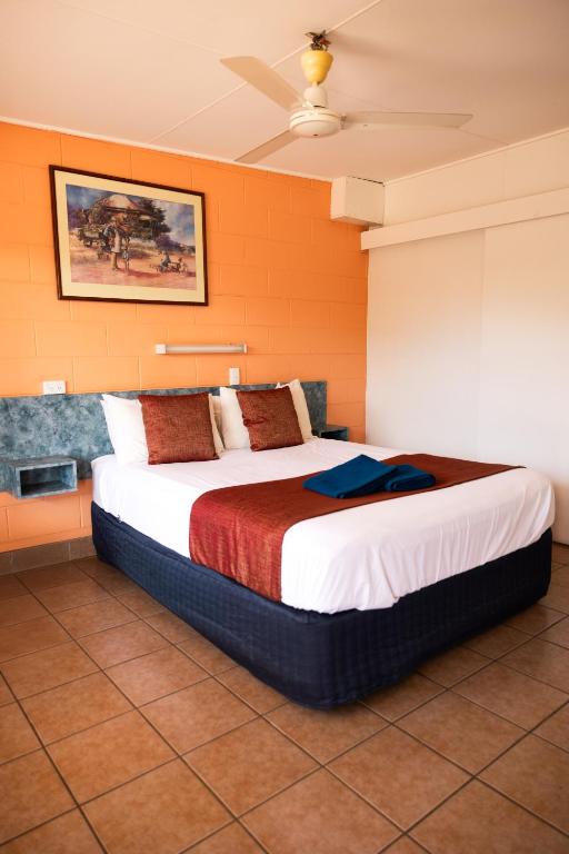 Postel nebo postele na pokoji v ubytování Wagon Wheel Motel
