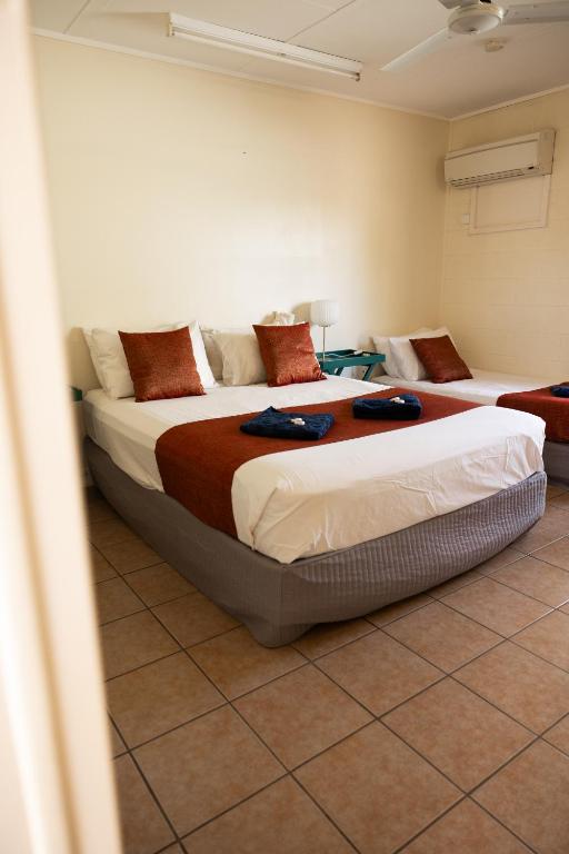 Postel nebo postele na pokoji v ubytování Wagon Wheel Motel