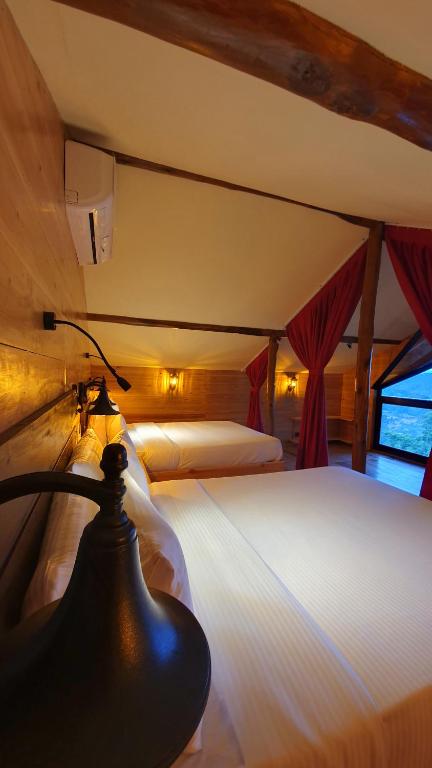 Postel nebo postele na pokoji v ubytování Guest Inn Avendra
