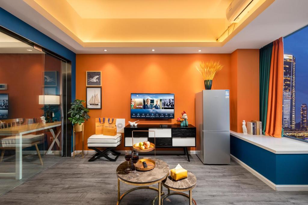 TV a/nebo společenská místnost v ubytování Chengdu Shuxi International Serviced Apartment