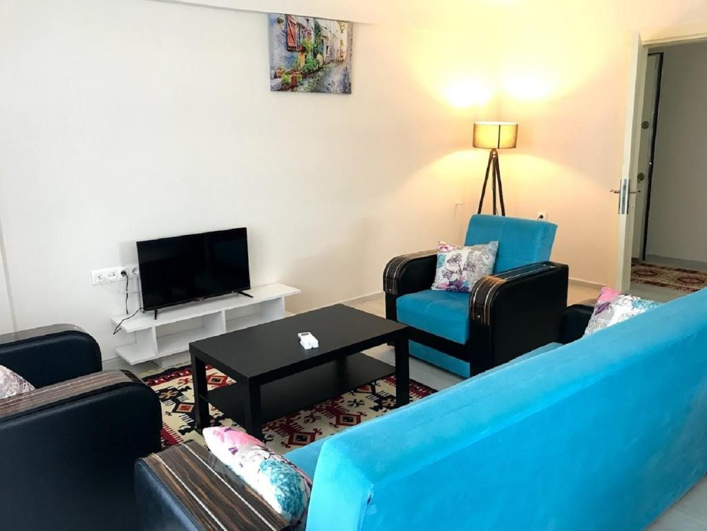 TV a/nebo společenská místnost v ubytování Dalaman Pansiyon & Family rooms