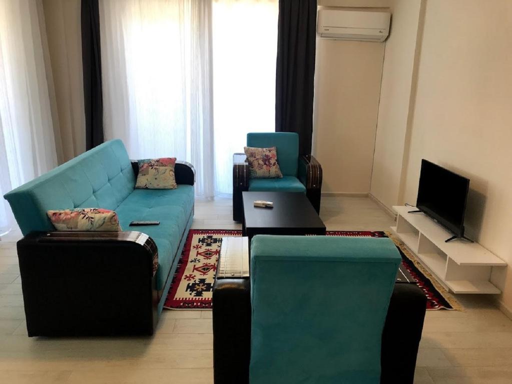 TV a/nebo společenská místnost v ubytování Dalaman Pansiyon & Family rooms