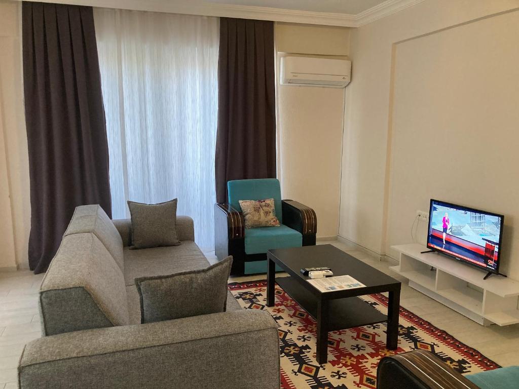TV a/nebo společenská místnost v ubytování Dalaman Pansiyon & Family rooms