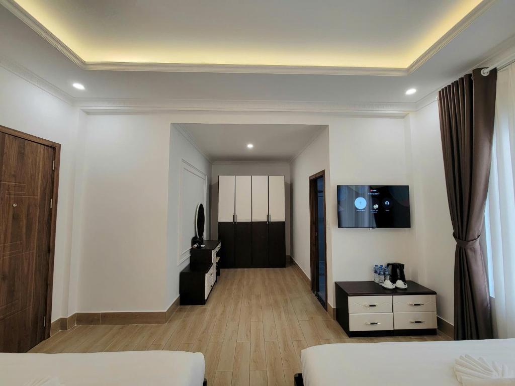 TV a/nebo společenská místnost v ubytování Savio Hotel Trieu Viet Vuong