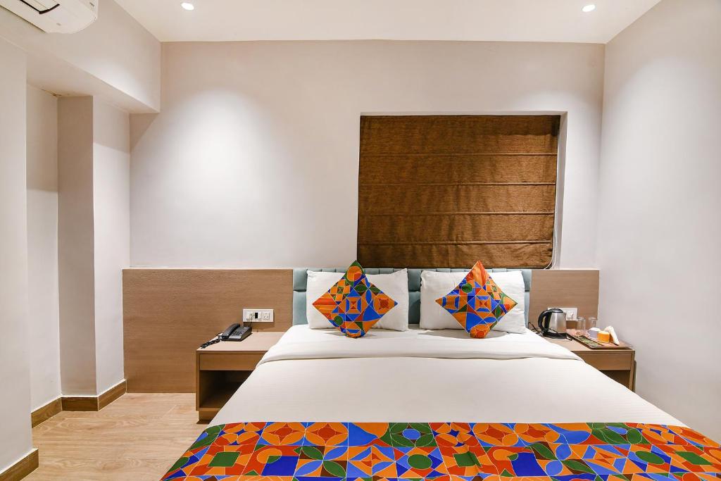 Postel nebo postele na pokoji v ubytování FabHotel Sivalika Inn - Belur Math