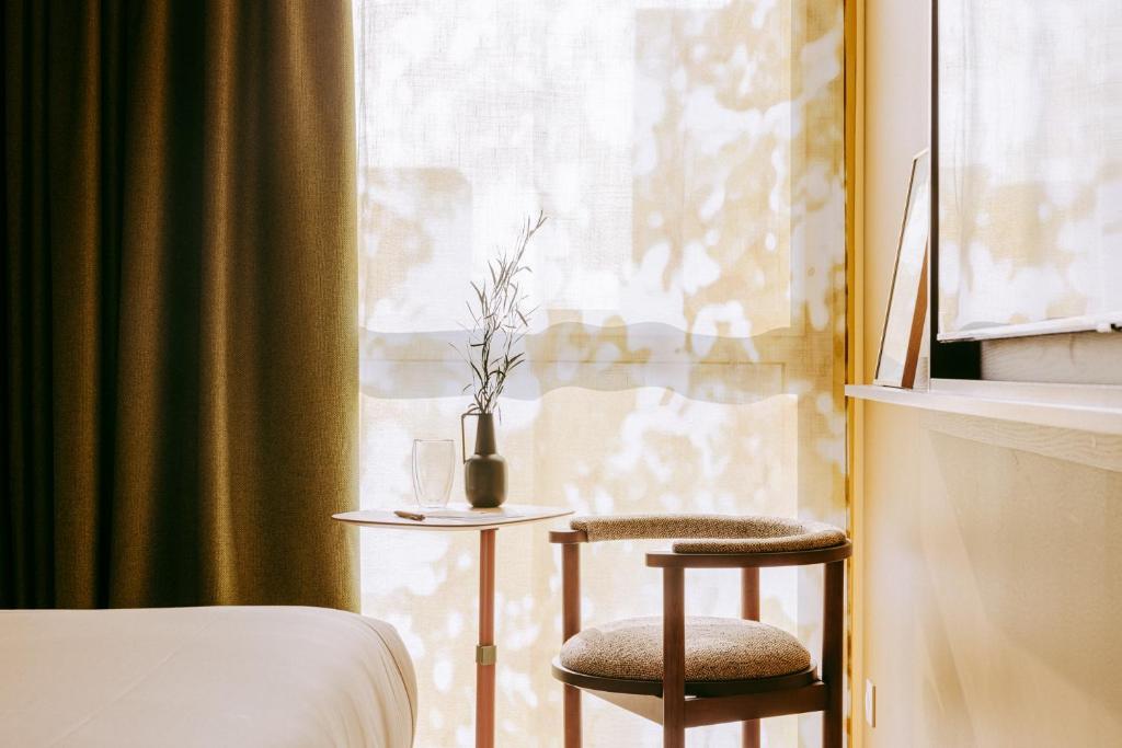 Postel nebo postele na pokoji v ubytování Sangha Toulouse