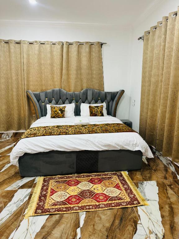 Postel nebo postele na pokoji v ubytování Abaad Heritage Inn