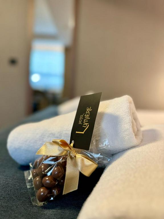 Krevet ili kreveti u jedinici u okviru objekta Lumière Hotel