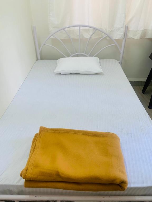 Postel nebo postele na pokoji v ubytování Palolem Paradise Guest House