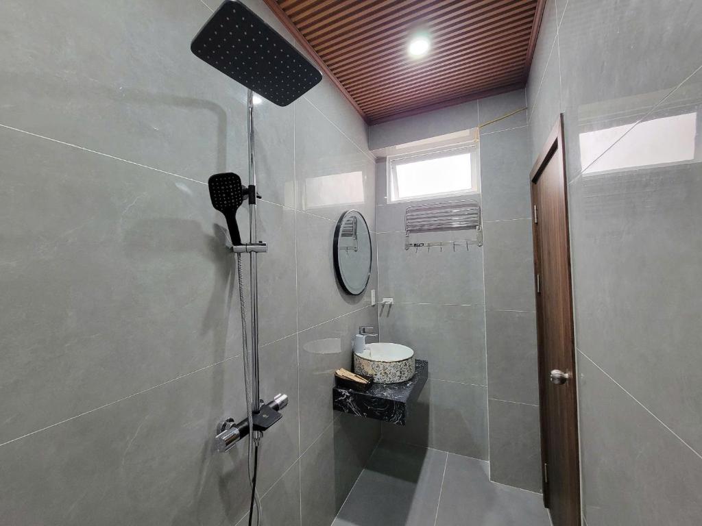 Koupelna v ubytování Savio Hotel Trieu Viet Vuong