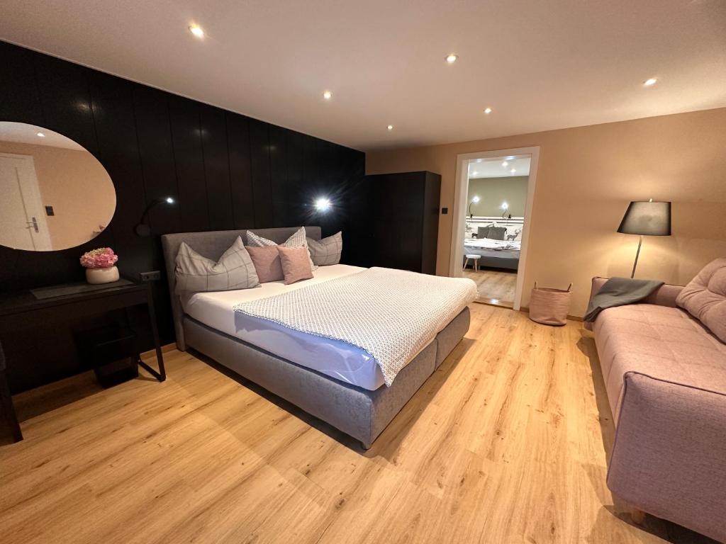 Postel nebo postele na pokoji v ubytování Alba Apartments