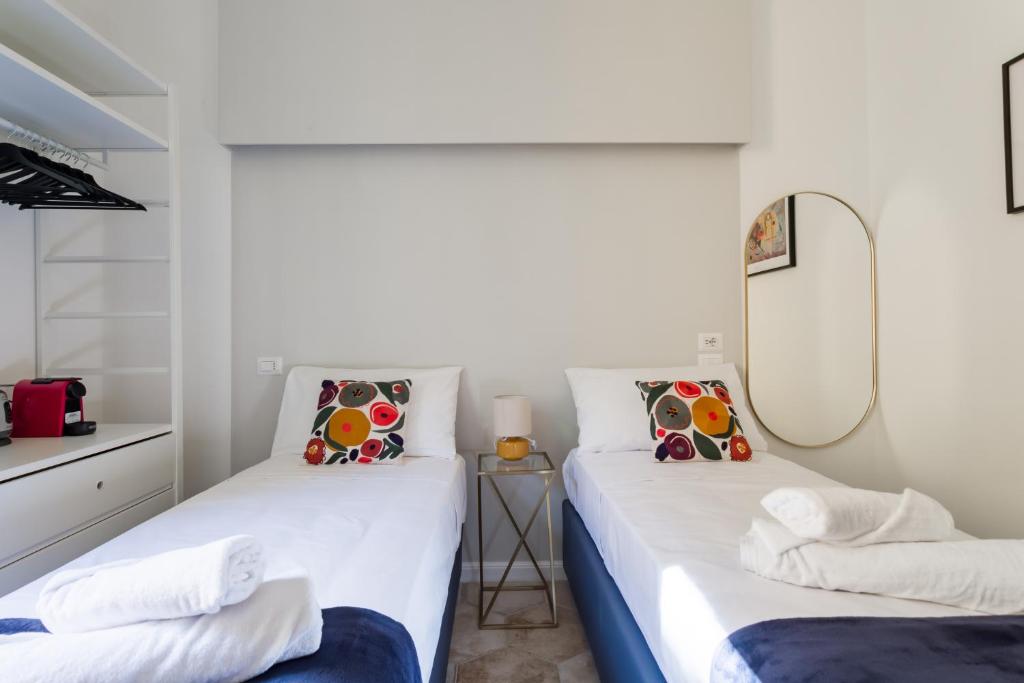 Postel nebo postele na pokoji v ubytování Casa Mancini B&B