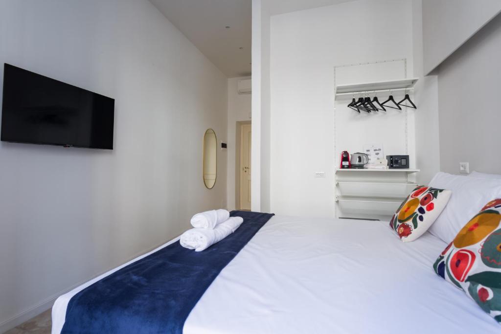 Postel nebo postele na pokoji v ubytování Casa Mancini B&B