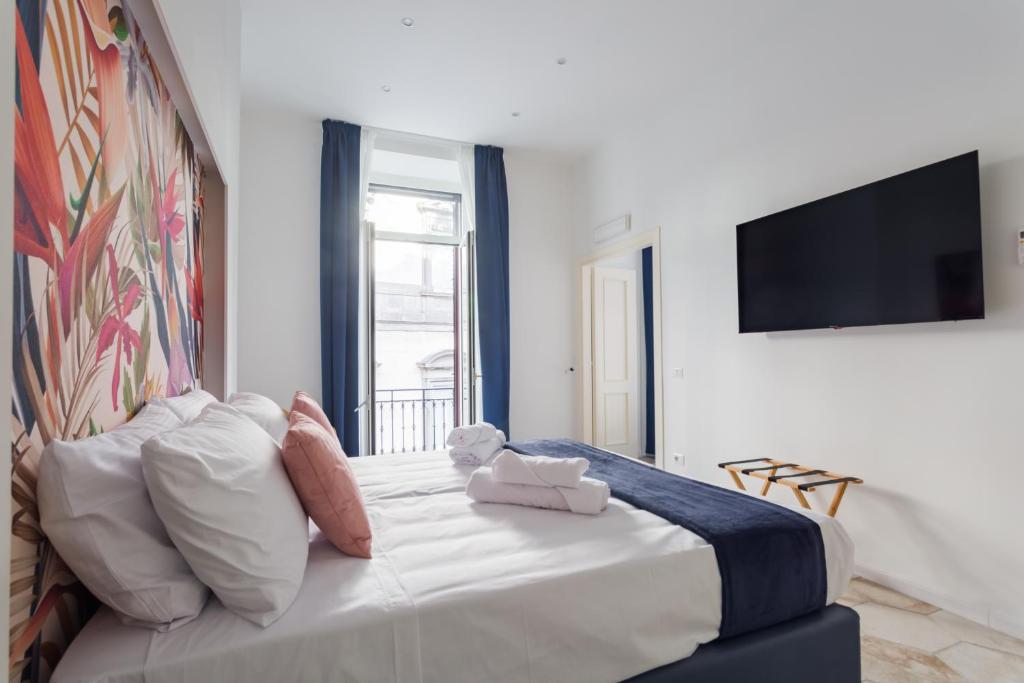 Postel nebo postele na pokoji v ubytování Casa Mancini B&B