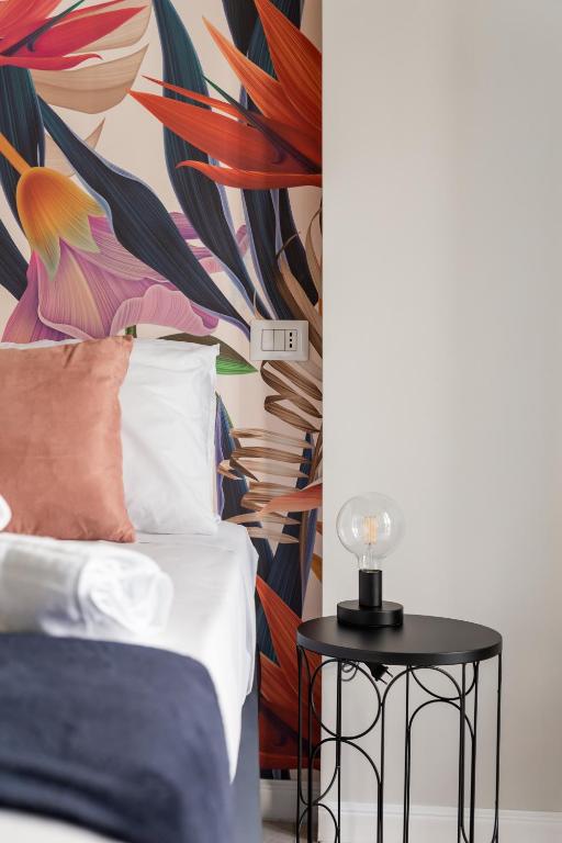 Postel nebo postele na pokoji v ubytování Casa Mancini B&B