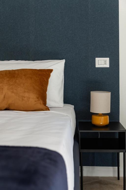 Postel nebo postele na pokoji v ubytování Casa Mancini B&B