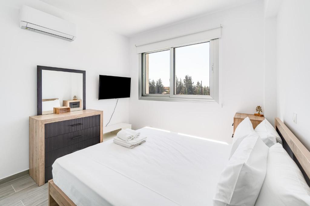 Postel nebo postele na pokoji v ubytování Villa Eleni by Ezoria Villas