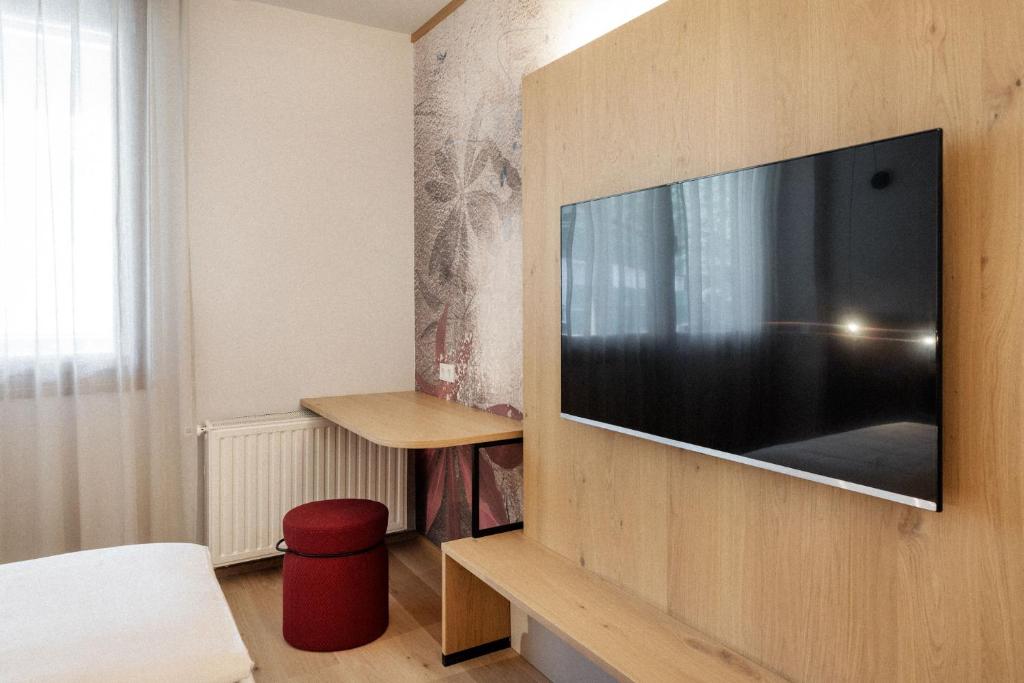 TV a/nebo společenská místnost v ubytování Heilthermen Resort Bad Waltersdorf