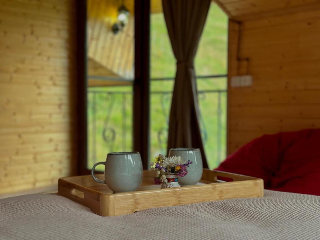 Postel nebo postele na pokoji v ubytování Rakursi