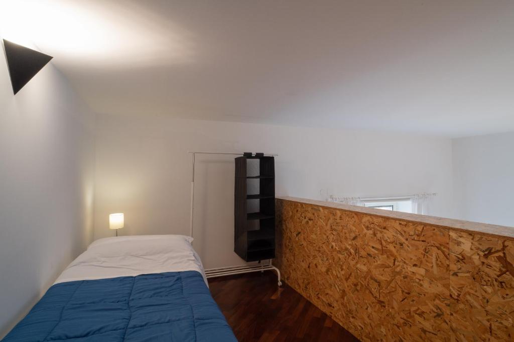 Łóżko lub łóżka w pokoju w obiekcie Ecce Homo 28